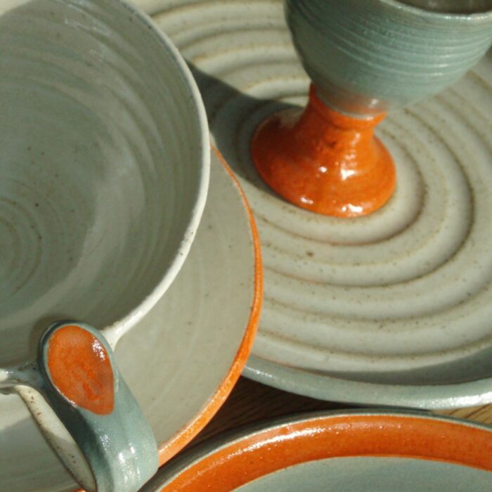Vase - tin glazed earthenware with sgraffito design and underglaze colours