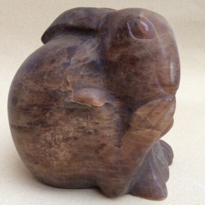 Crouching Hare - Brown alabaster - H: 19cms W: 13.5cms D: 17.5cms - by Willow Legge