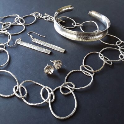 'Pebble' necklace, bangle and earrings. - Sterling silver. - 200x200mm - by Andrew Bailey