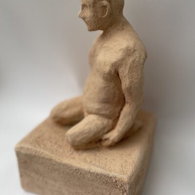 Kneeling man on plinth - Stoneware clay - modelled. - 270mm - by Christine Burgess
