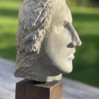 Downsman - Stone hand carved on wooden plinth - 55cm h x 38 w x 30 d - by Johnny Seal