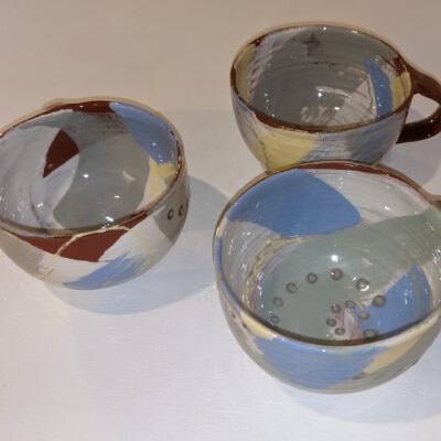 cups - earthenware with slips - 4-5 in width - by Francisca Blackburne