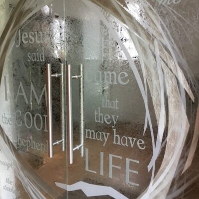 Wrekin College Chapel - Glass, etched, silvered and sandblasted - entrance door - by Jane Campbell