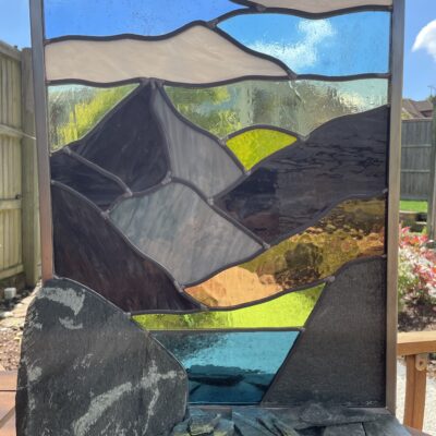 The Lakes - Stained Glass set in Stainless Steel and Slate - 50x41x25cm - by Caroline Frankland