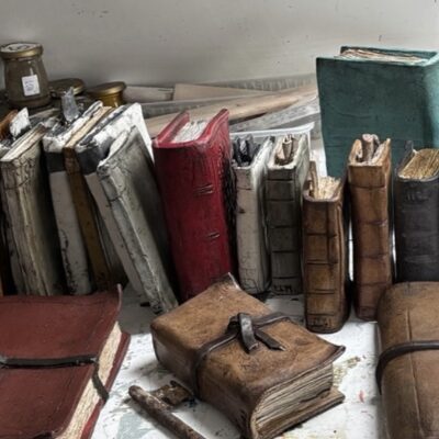 Library of books - Clay, pigment and wax - various - by Liz Hanan